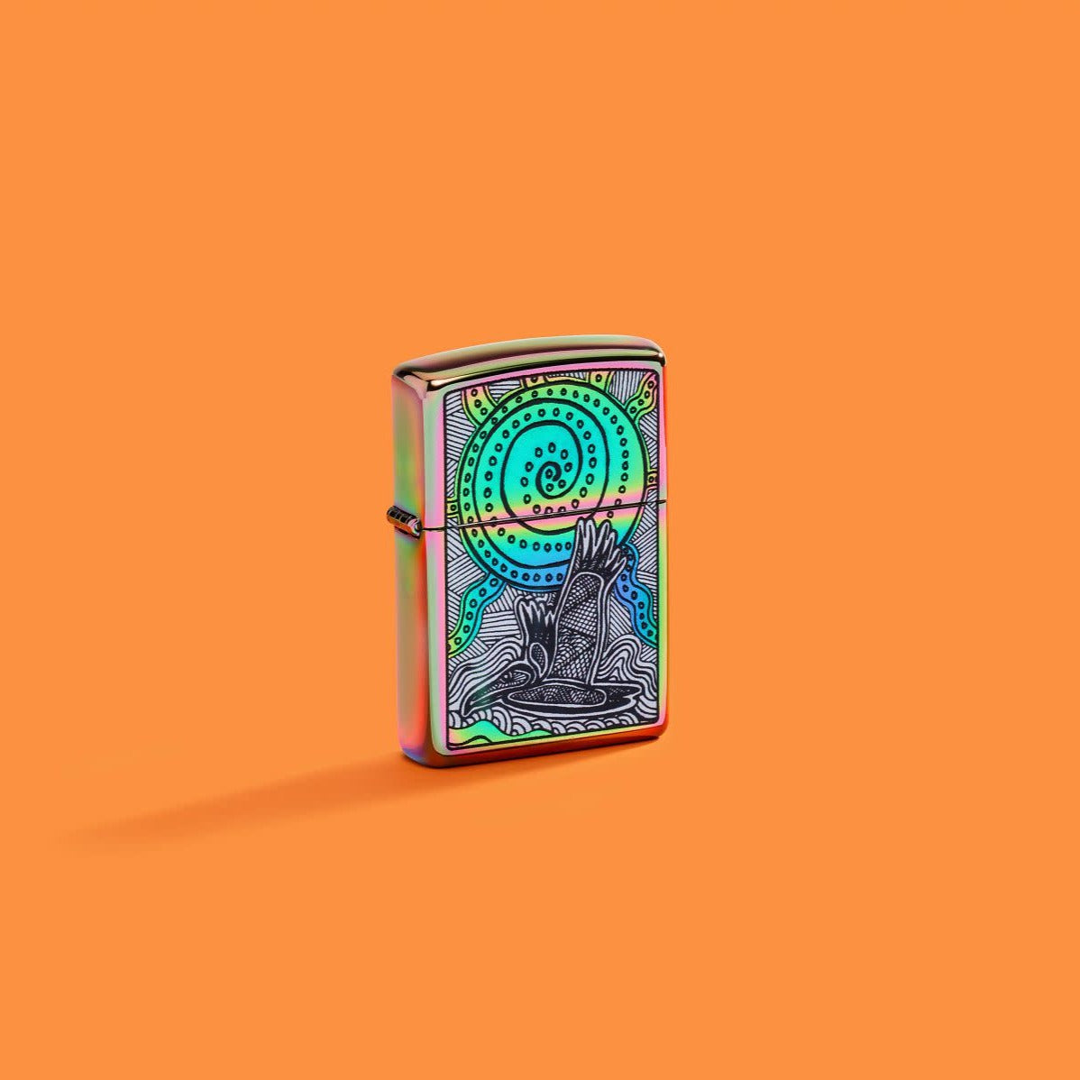 Lifestyle image of Zippo John Smith Gumbula Multi-Color Windproof Lighter on an orange background.