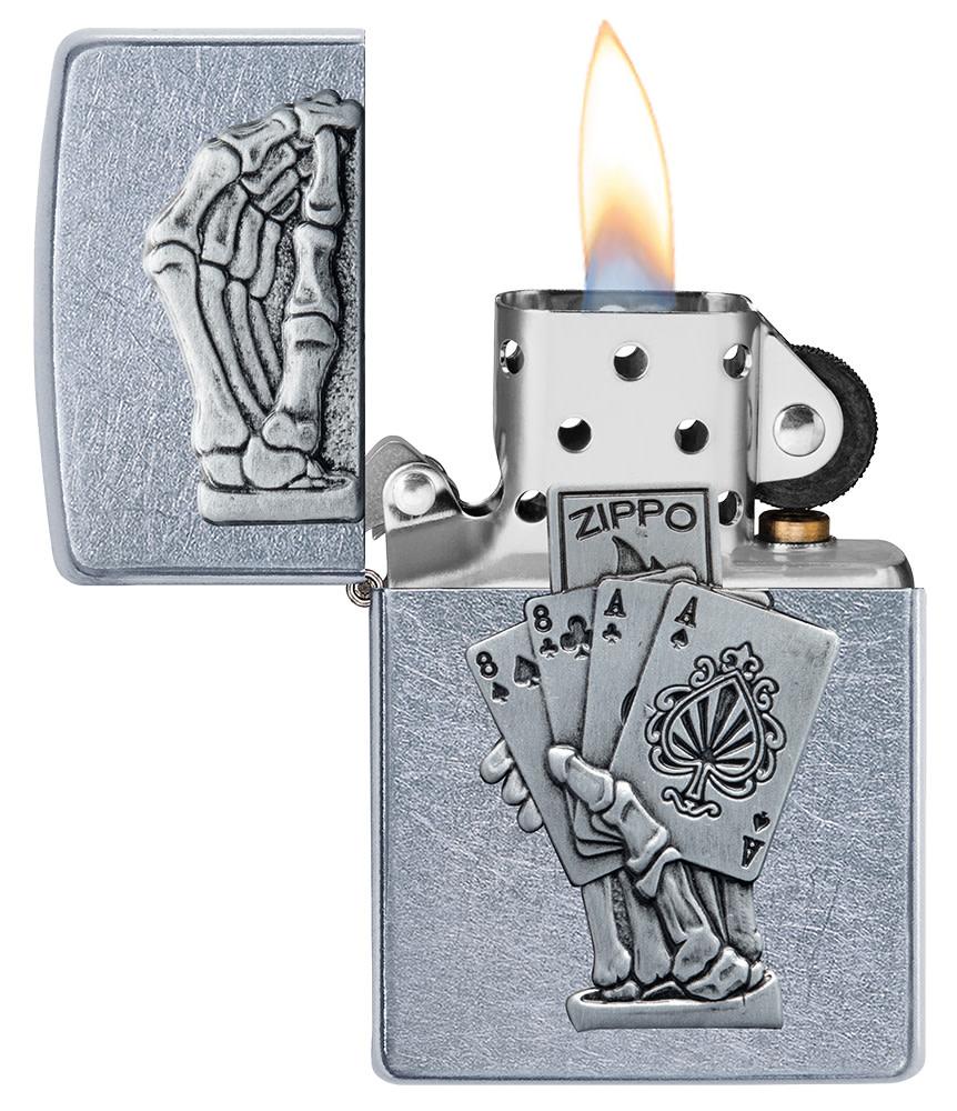 Dead Mans Hand Surprise Emblem Design Street ChromeÆ?⺠Windproof Lighter with its lid open and lit