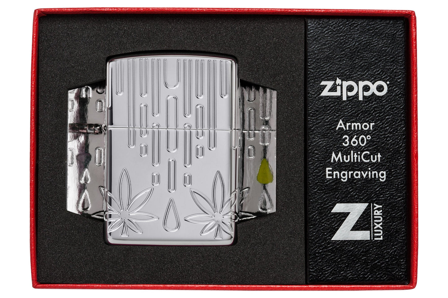 Zippo Waxy Leaf Design Armor?? High Polish Chrome Windproof Lighter in its packaging.