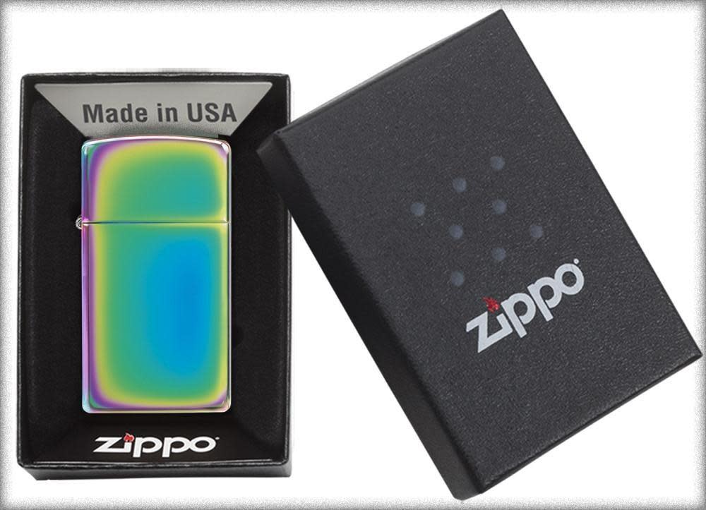 Slim?? Multi Color Windproof Lighter in its packaging.