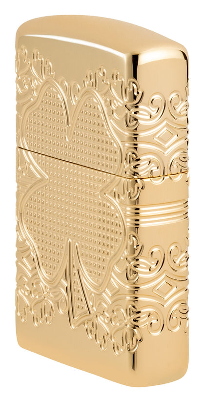 Angled shot of Zippo Lucky Clover Design Armor?? High Polish Gold Plate Windproof Lighter showing the front and right side of the lighter.