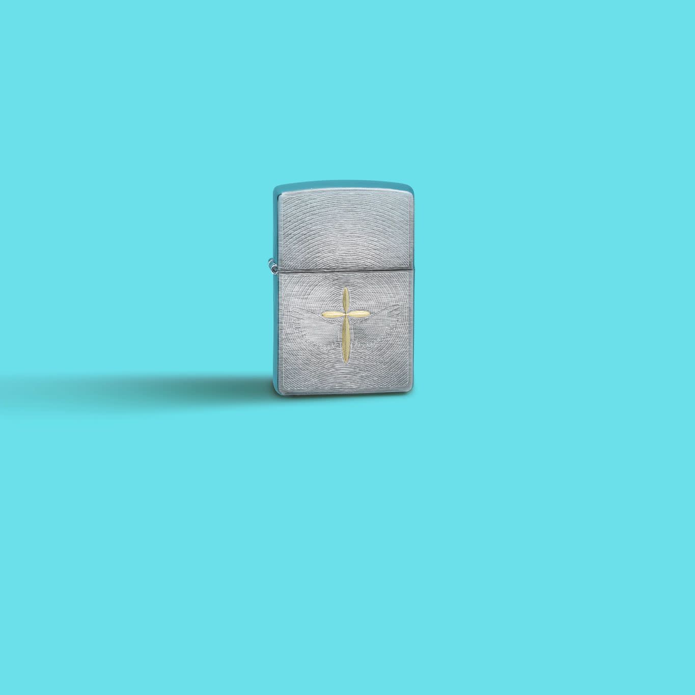 Lifestyle image of Zippo Angel Aura Design Brushed Chrome Windproof Lighter in a blue scene.