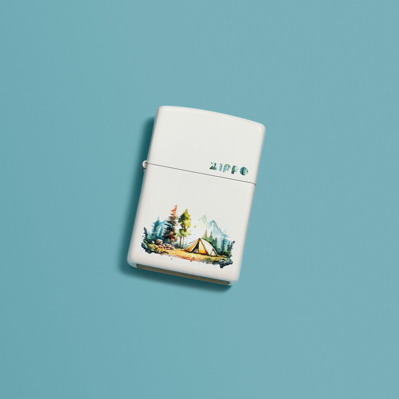 Lifestyle image of Zippo Nature Retreat Design White Matte Windproof Lighter in a blue scene.