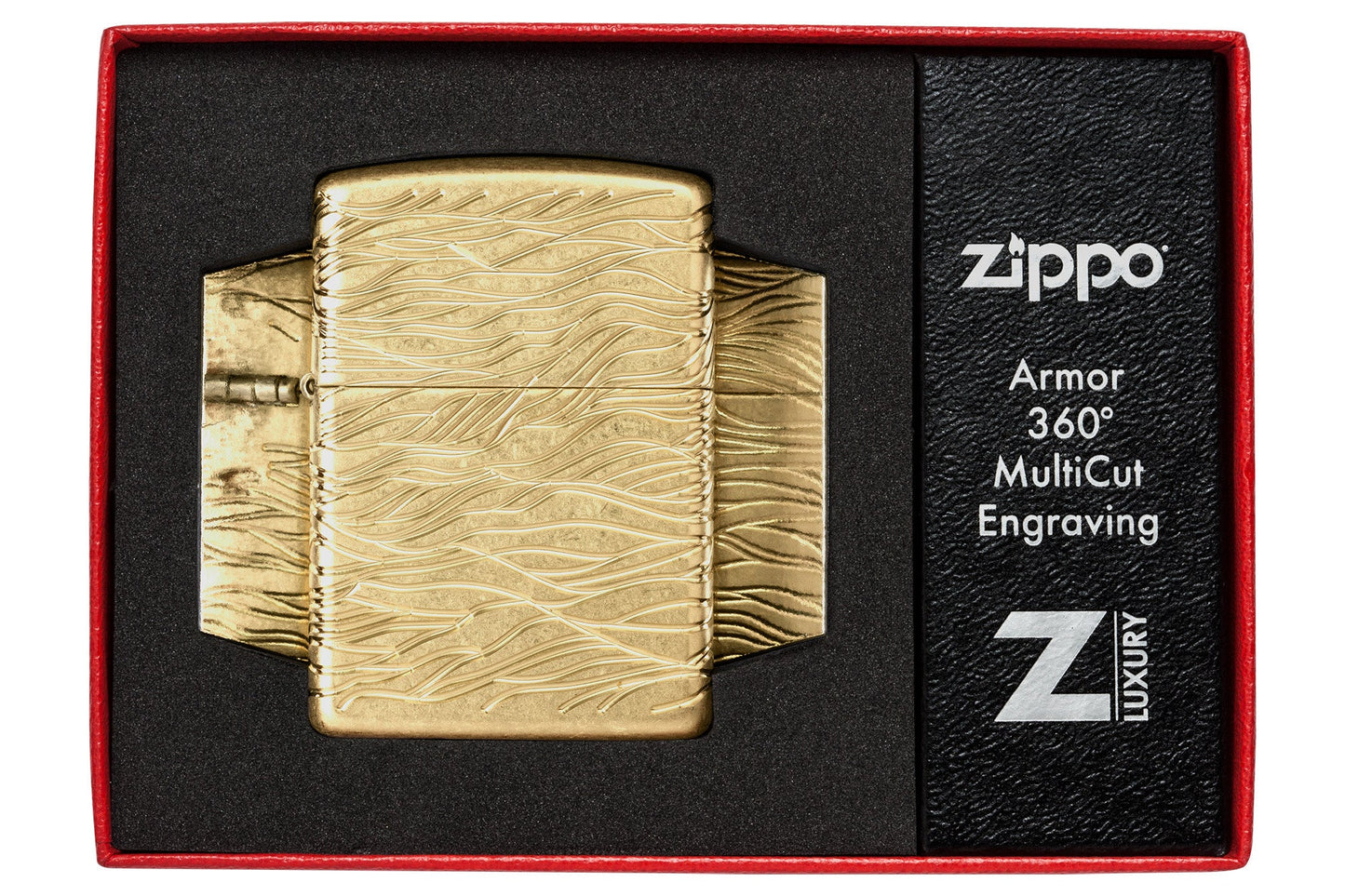 Zippo Luxury Waves Design Armor Tumbled Brass Windproof Lighter in its packaging.