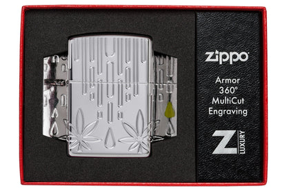 Zippo Waxy Leaf Design Armor?? High Polish Chrome Windproof Lighter in its packaging.