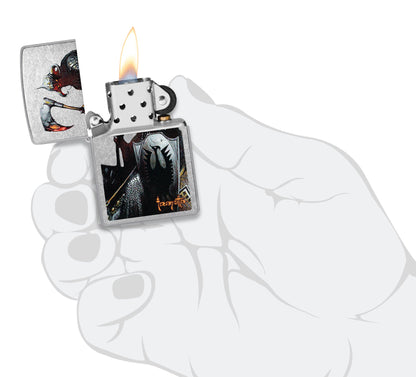 Zippo Frank Frazetta Death Dealer Street Chrome Windproof Lighter lit in hand.